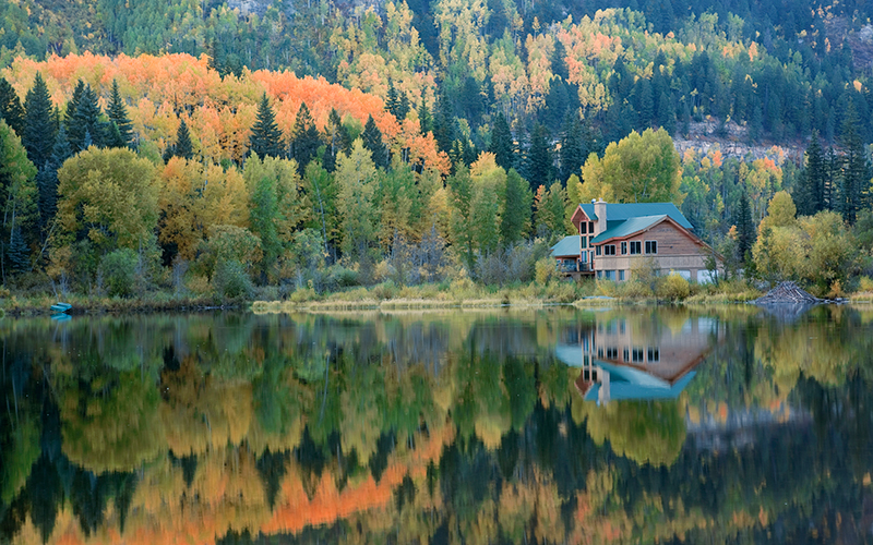 Beautiful fall view of lodge on lake in blackduck mn